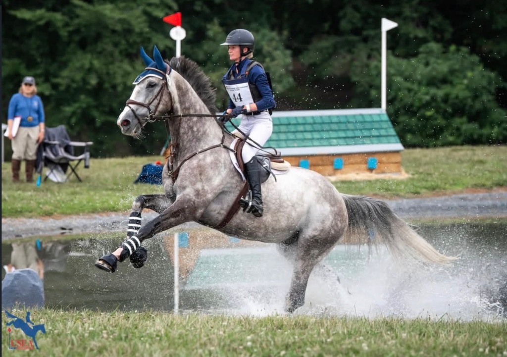 Sterling Pollard & Tinto galloping through cross-country water jump